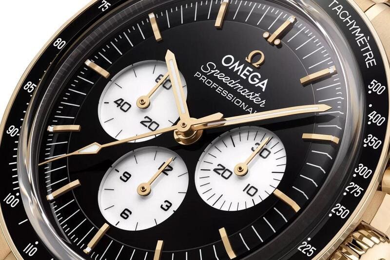 Omega Speedmaster Moonwatch Professional New Lacquered Reverse Panda 18k Moonshine Gold edition watch - Reference 310.60.42.50.01.002 dial up close