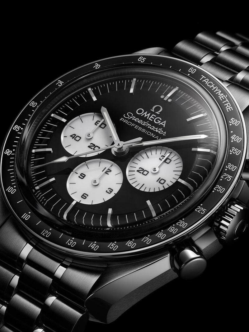 Omega Speedmaster Moonwatch Professional New Lacquered Reverse Panda black strap watch up close